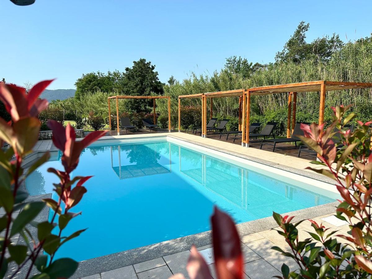 Le Village Sarzana Bagian luar foto