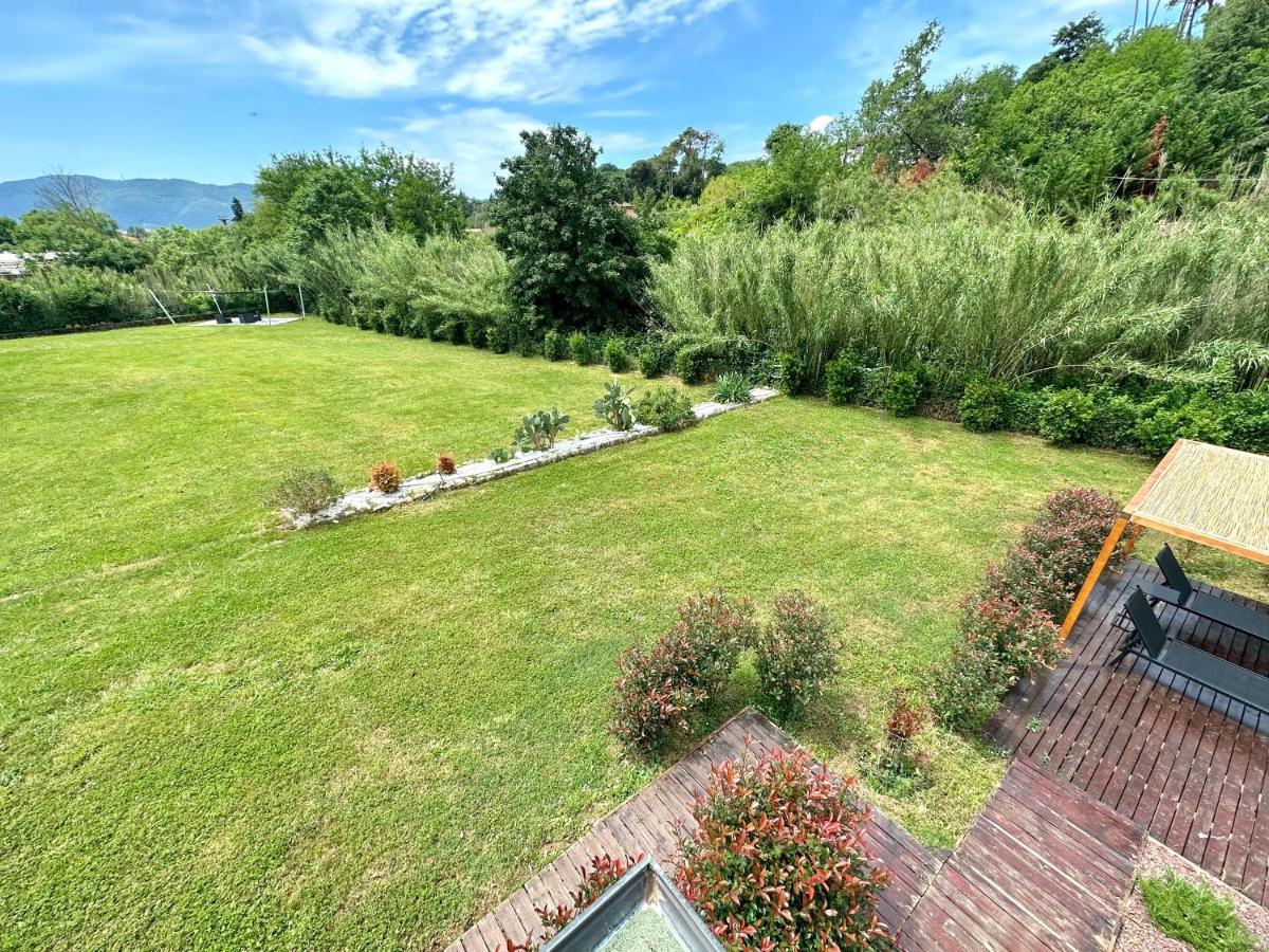 Le Village Sarzana Bagian luar foto